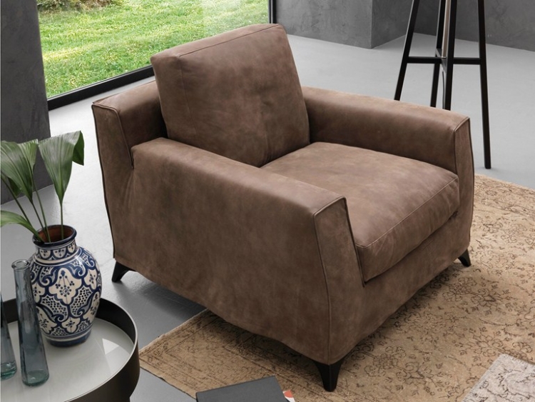 28-Designer-chair-perfect-fireplace-area-cigar-lounge-MR-FLOYD-Bodema